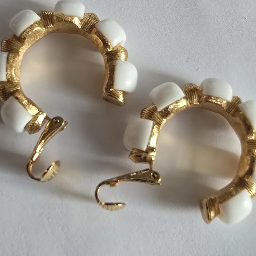 Vintage Trifari earrings Crown hoop white plastic gold tone metal clip on